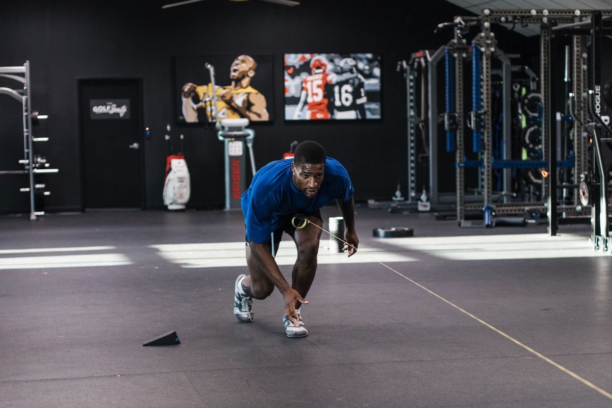 Professional athlete resistance band lateral work