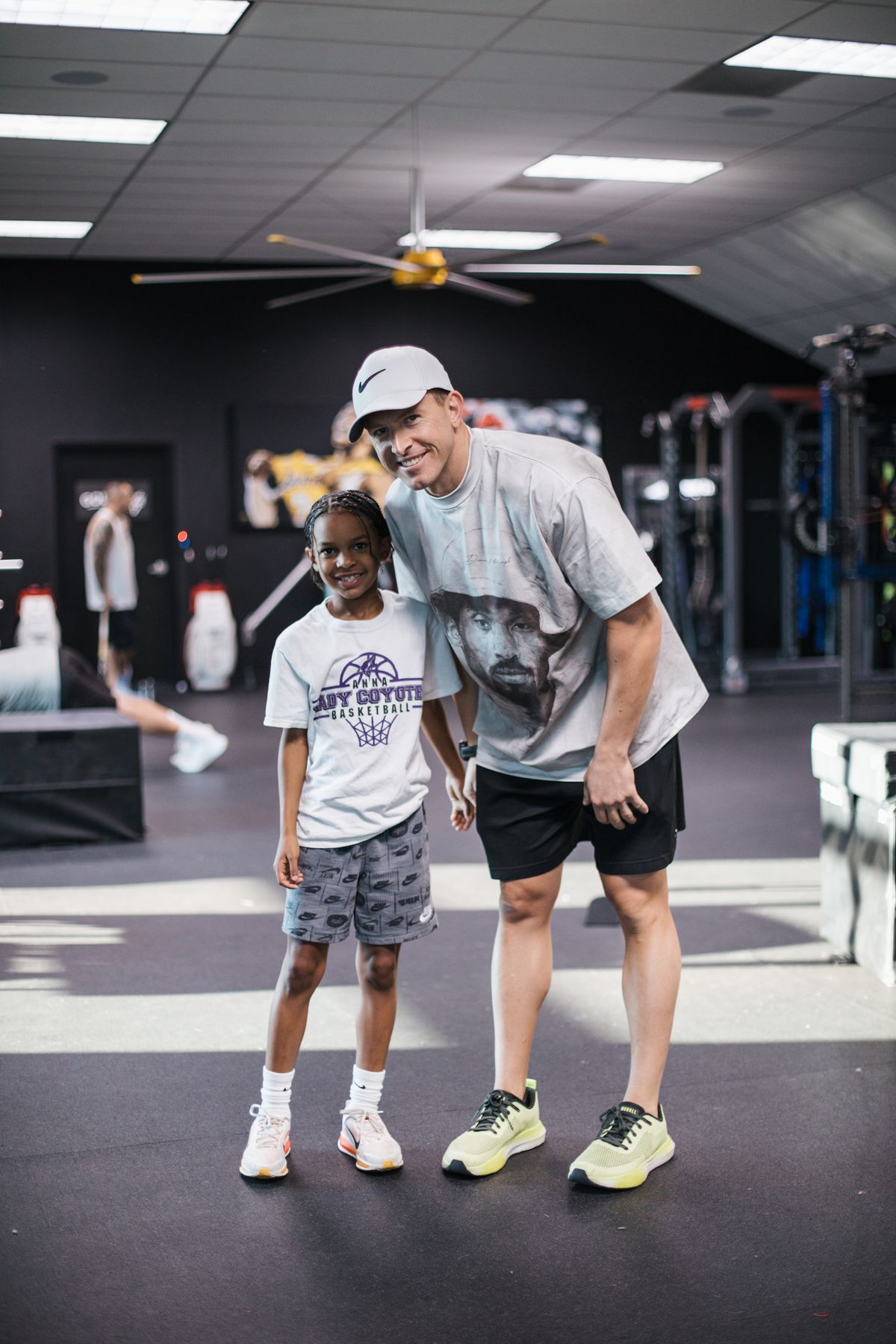 Coach working with young athlete
